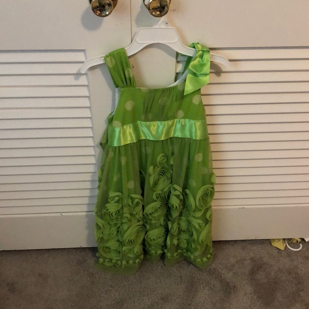 Cute green dress with poka dots and flowers